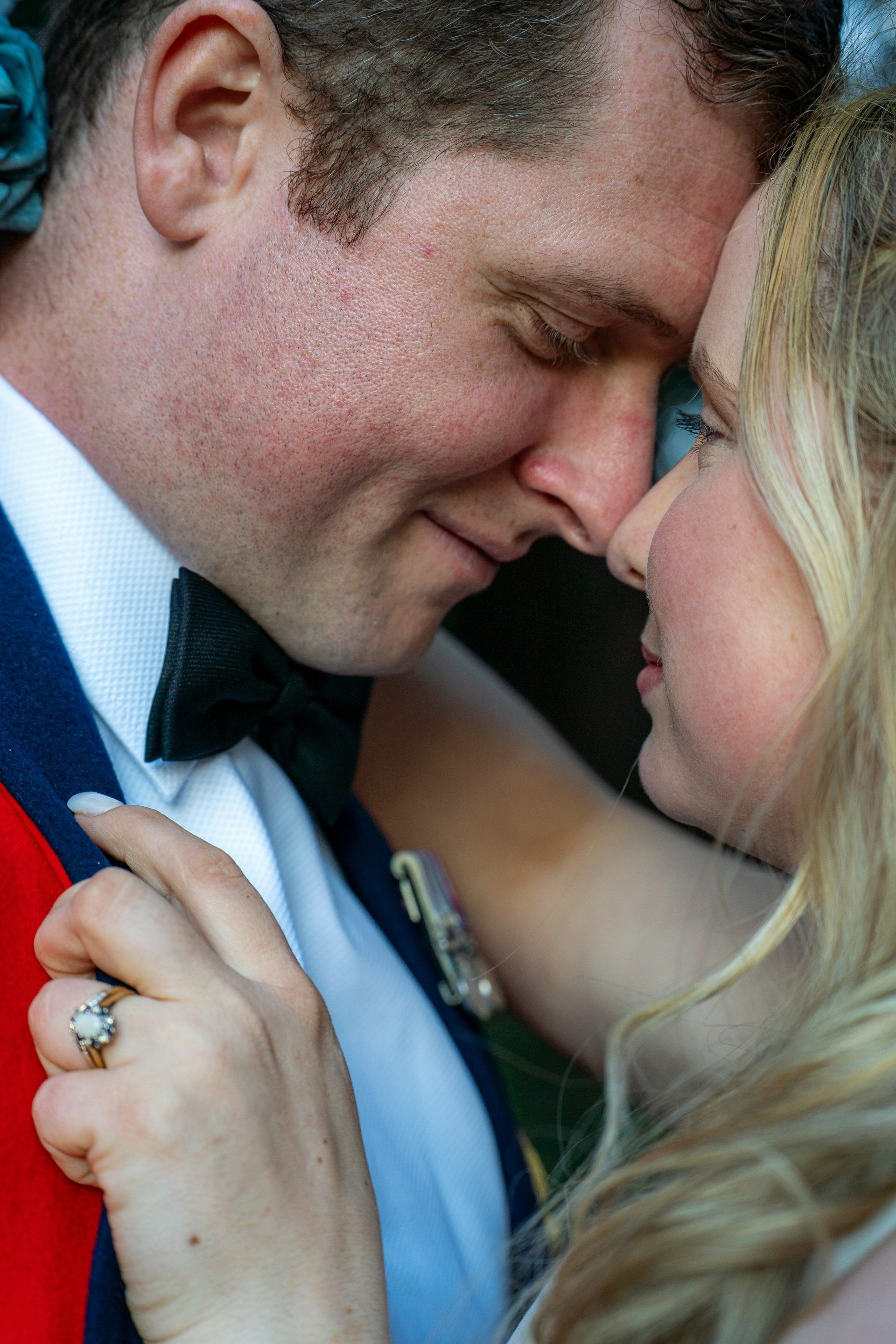 Bride and groom in a close embrace