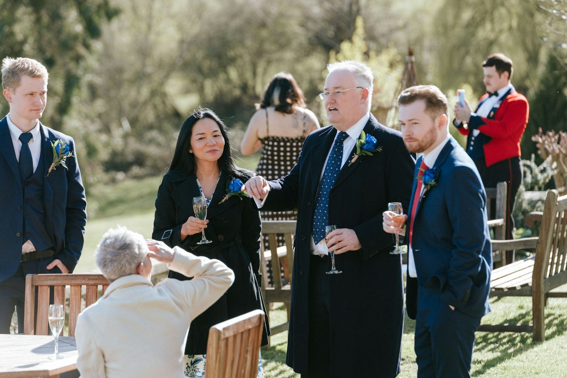 Guests chat over drinks at the reception