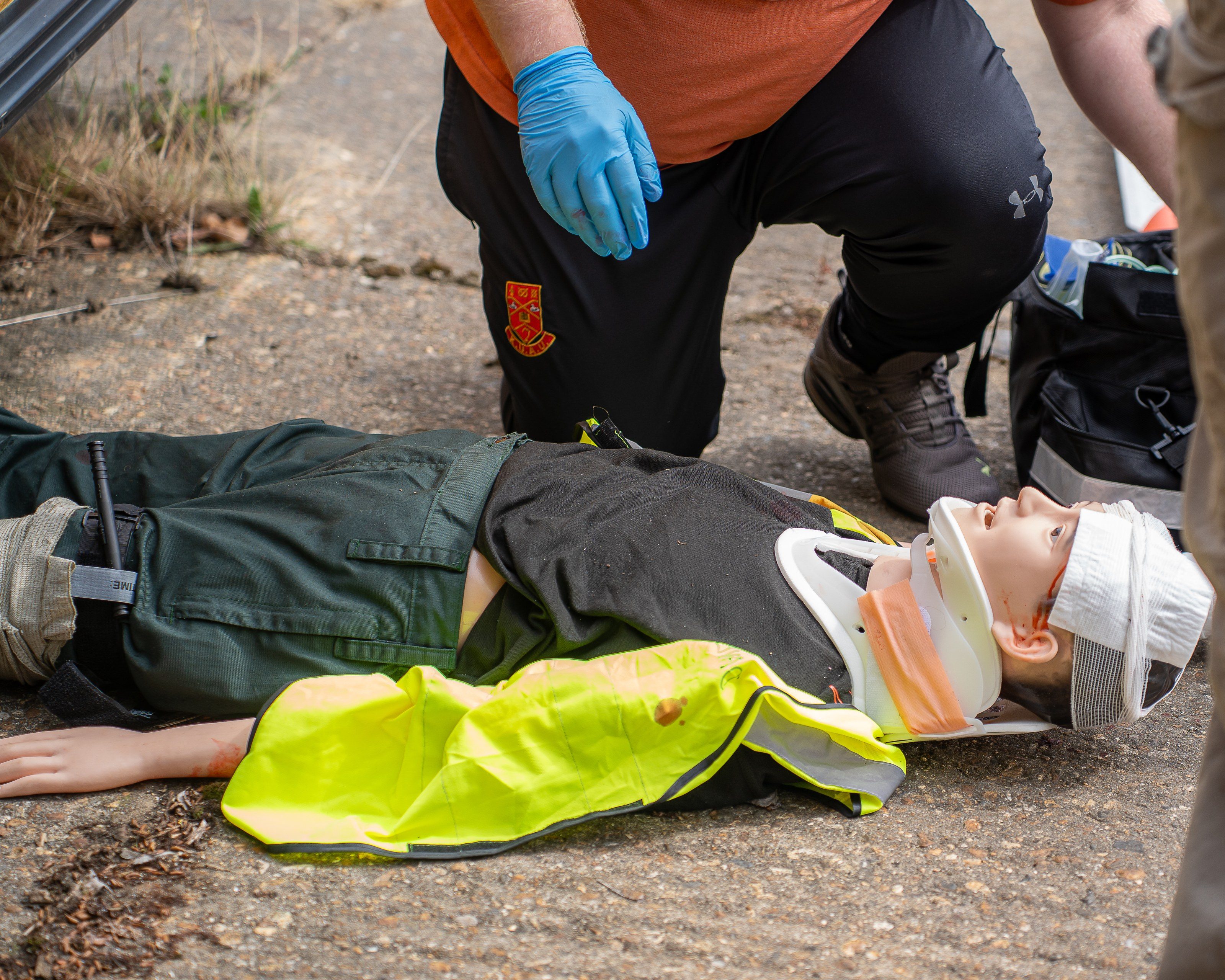 Trainees attend a casualty on the ground