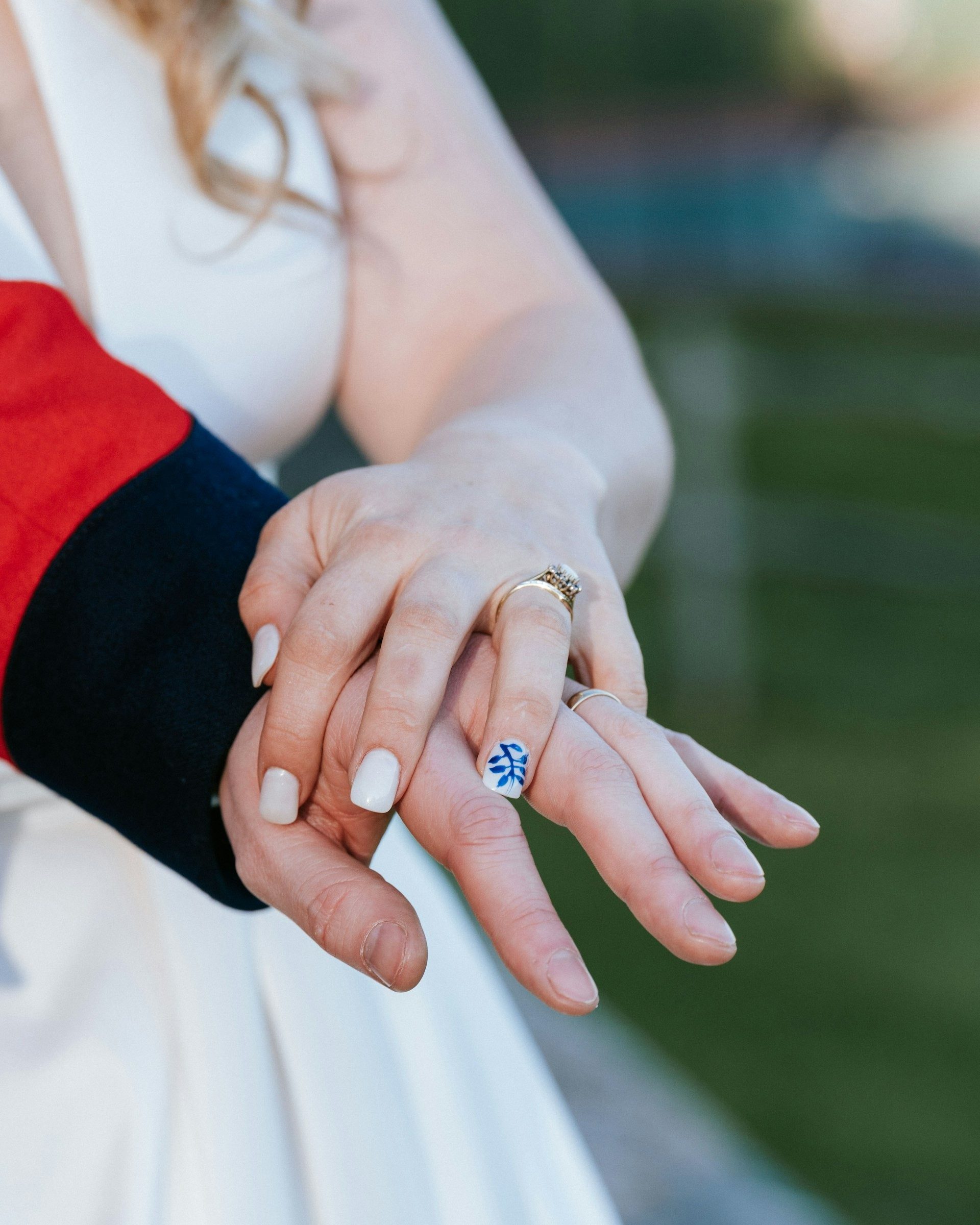 Close up of the bride’s sapphire engagement ring