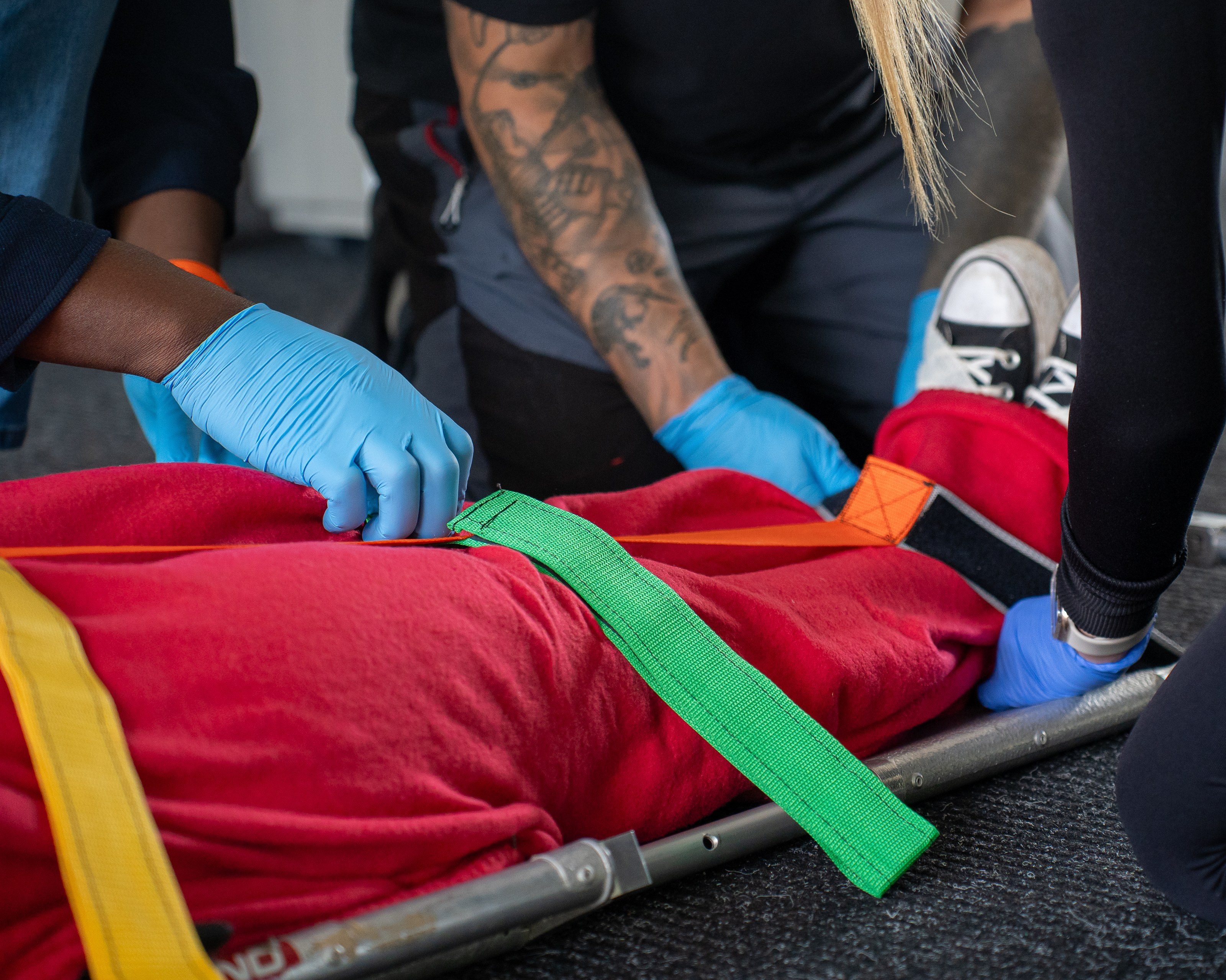 Casualty strapped onto a stretcher
