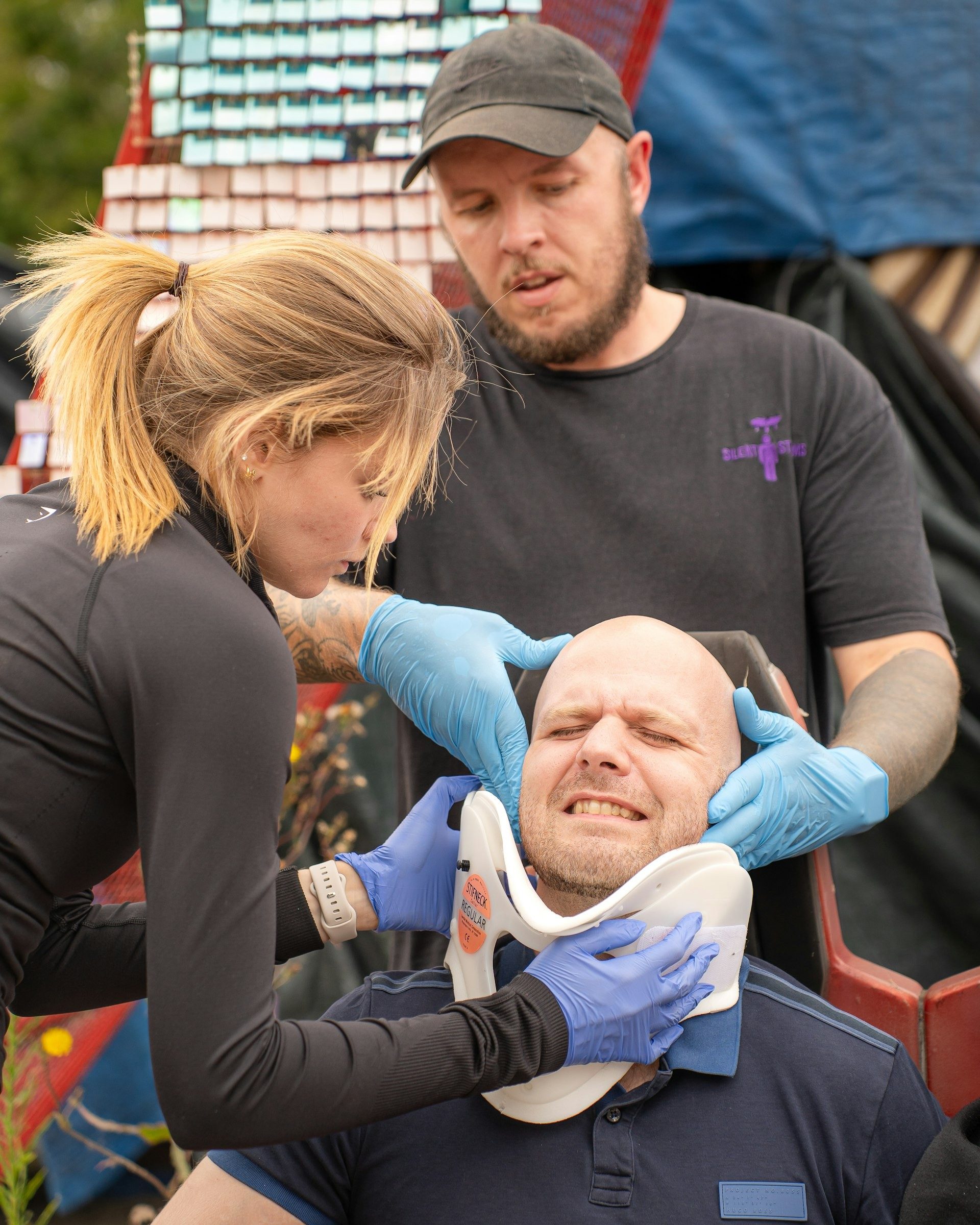 Trainees practise fitting a neck collar