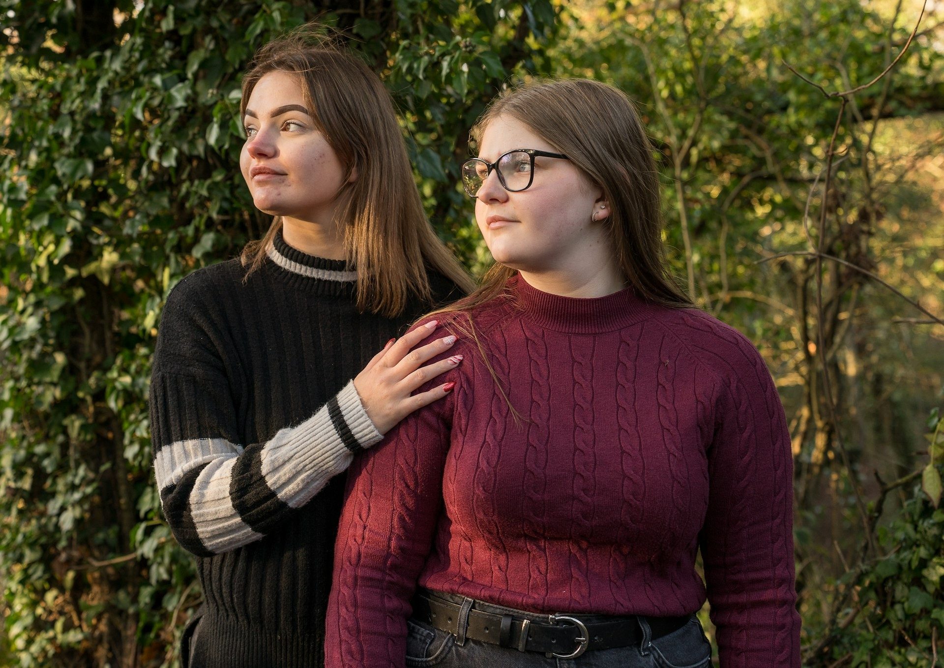 Two young women in a woodland portrait